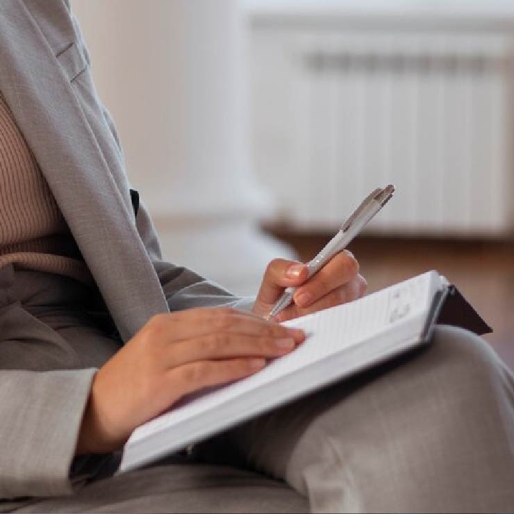 smiling-female-architects-drinking-tea-using-tablet_1262-18680-01
